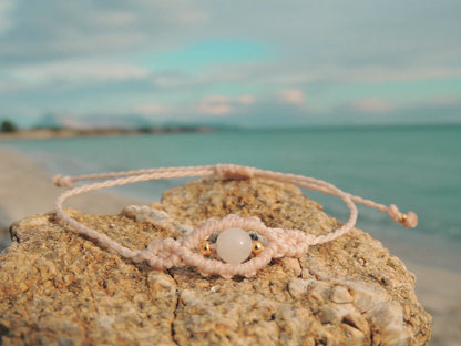 Amuleto da viaggio in macramè con pietre naturali occhio