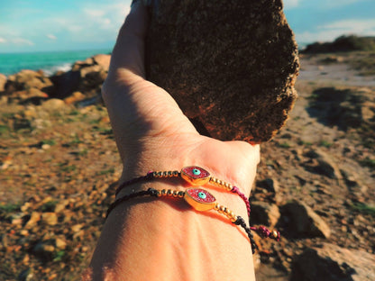 Amuleto da viaggio in macramè con Occhio Turco glitter