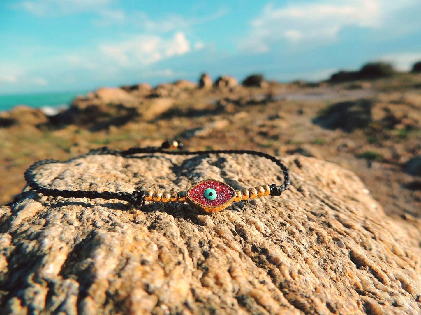 Amuleto da viaggio in macramè con Occhio Turco glitter