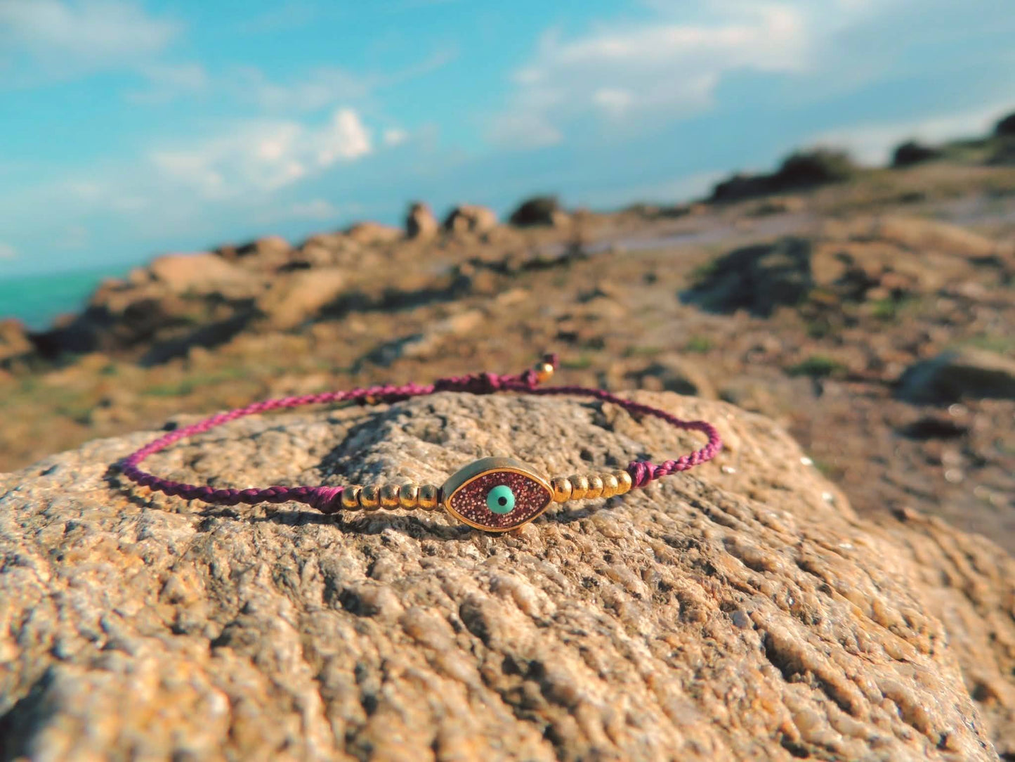 Amuleto da viaggio in macramè con Occhio Turco glitter